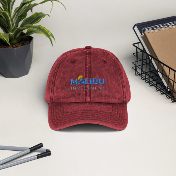 Red Malibu Investment baseball cap.