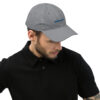 Man wearing gray Malibu boom hat.