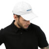 Man wearing white Malibu boom hat.